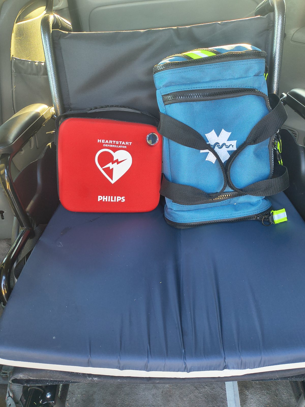 The AED and first aid kit carried in the vehicle